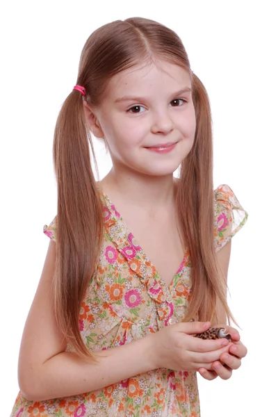 Girl holding sea shell — Stock Photo, Image