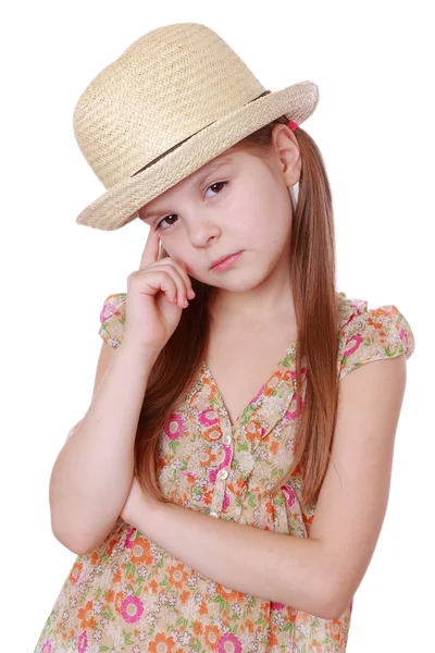 Little girl in summer dress and straw hat — Stock Photo, Image