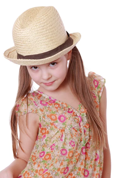 Little girl in summer dress and straw hat — Stock Photo, Image