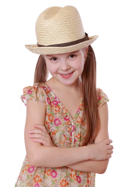 Küçük kız yazlık elbise ve hasır şapka — Stok fotoğraf