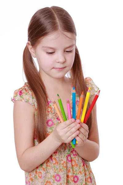 Meisje met kleurrijke potloden — Stockfoto