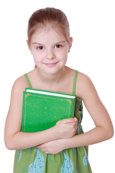 Ragazza in possesso di grande libro verde — Foto Stock