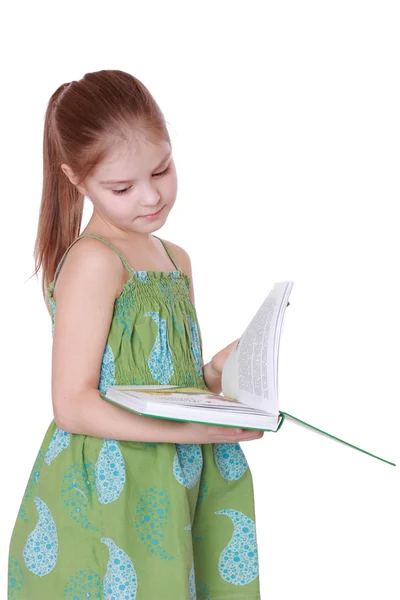 Ragazza in possesso di grande libro verde — Foto Stock