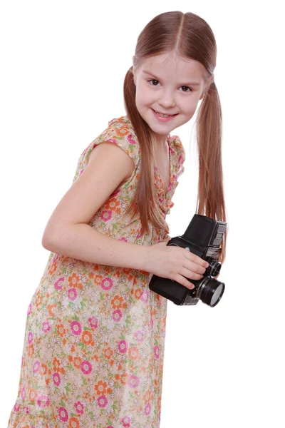 Menina com câmera vintage — Fotografia de Stock