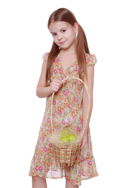 Girl holding basket with Easter eggs — Stock Photo, Image