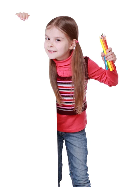 Menina segurando lápis coloridos — Fotografia de Stock