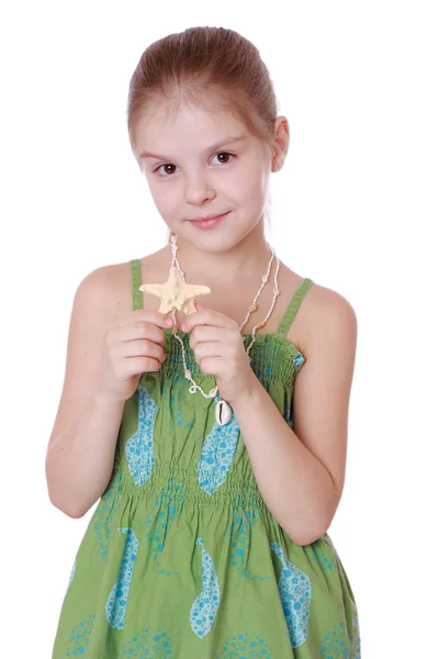 Girl holding star fish — Stock Photo, Image