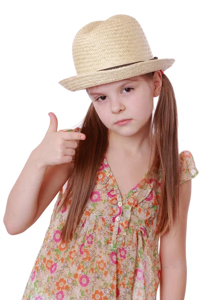 Het dragen van kleding en stro hoed meisje — Stockfoto