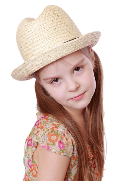 Menina vestindo vestido e chapéu de palha — Fotografia de Stock