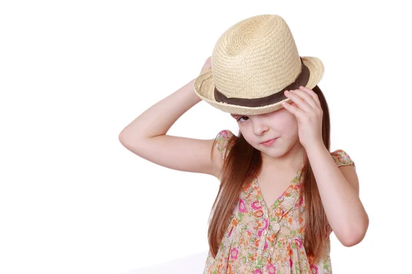 Girl wearing dress and straw hat — Stock Photo, Image