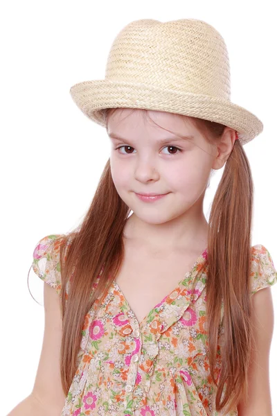 Girl wearing dress and straw hat — Stock Photo, Image