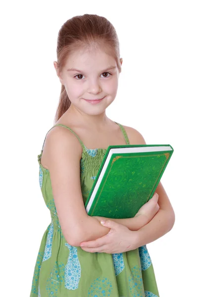 Niña con libro verde — Foto de Stock