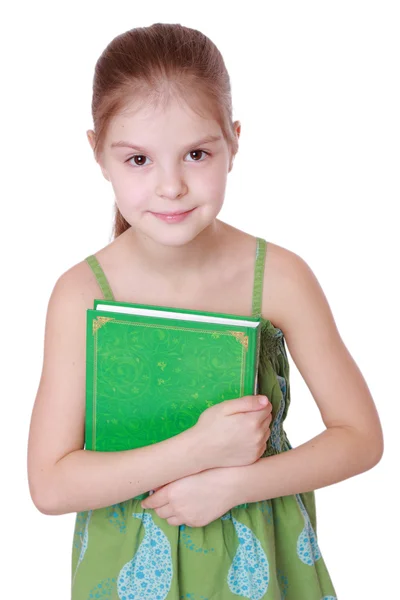 Bambina con libro verde — Foto Stock