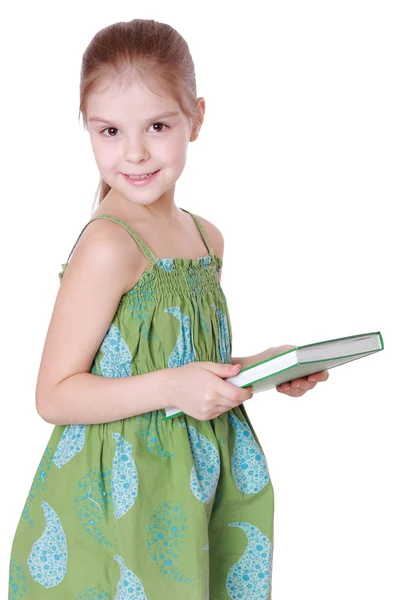 Menina com livro verde — Fotografia de Stock