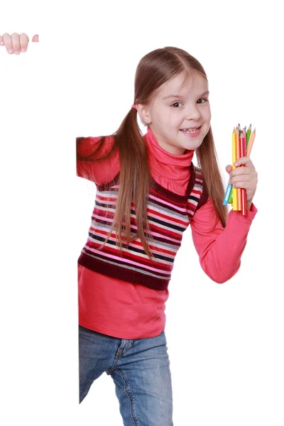 Fille avec crayons colorés — Photo