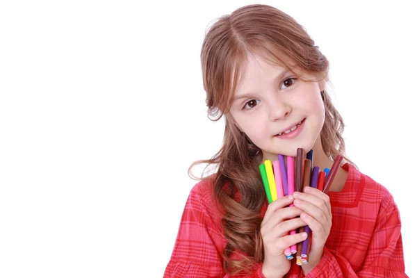 Little girl holding colorful felt-tip pens — Stock Photo, Image