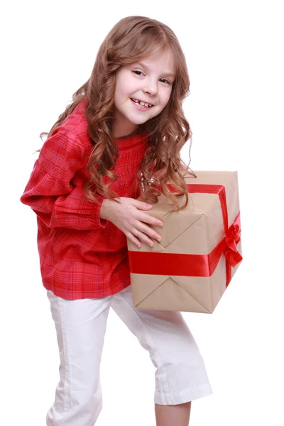 Klein meisje houdt van een geschenk — Stockfoto