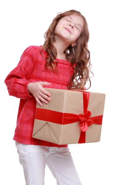 Menina segurando um presente — Fotografia de Stock