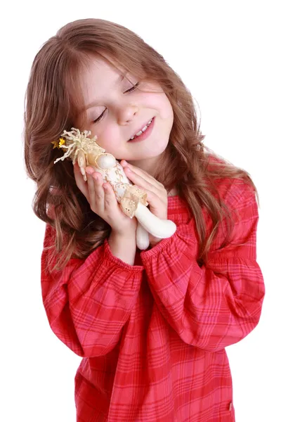 Holčička drží anděl panenka — Stock fotografie