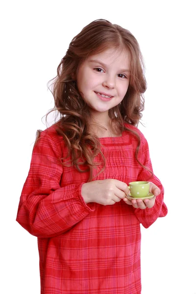 Petite fille jouant avec du thé miniature — Photo