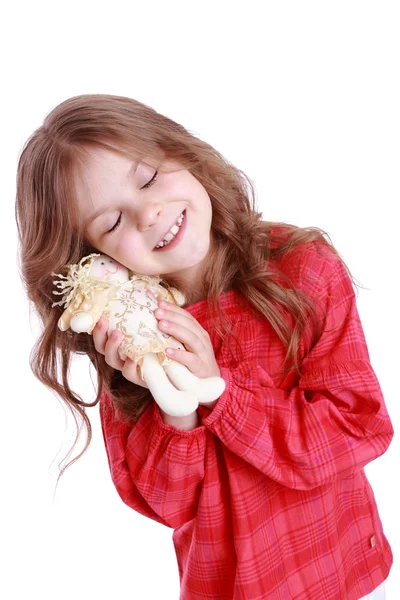 Little girl holding angel doll — Stock Photo, Image