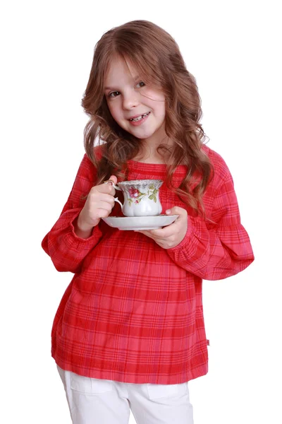 차 잔과 소스와 함께 어린 소녀 — 스톡 사진