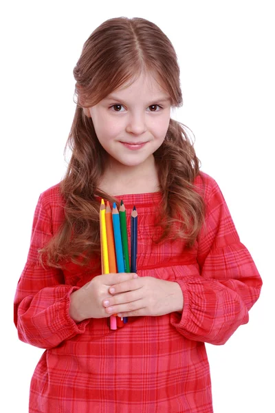 Kid with pencils — Stockfoto