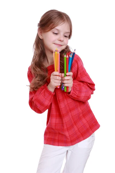 一年级学生手握彩色铅笔 — 图库照片