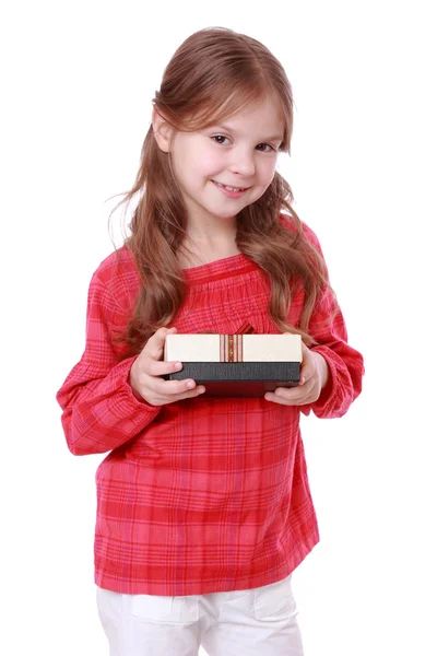 Smiling girl holding present — Stock Photo, Image