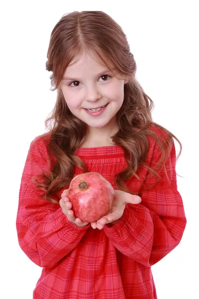 Dívka hospodářství granátového jablka — Stock fotografie