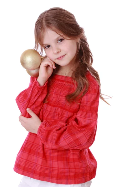 Niño sosteniendo bolas de Navidad — Foto de Stock