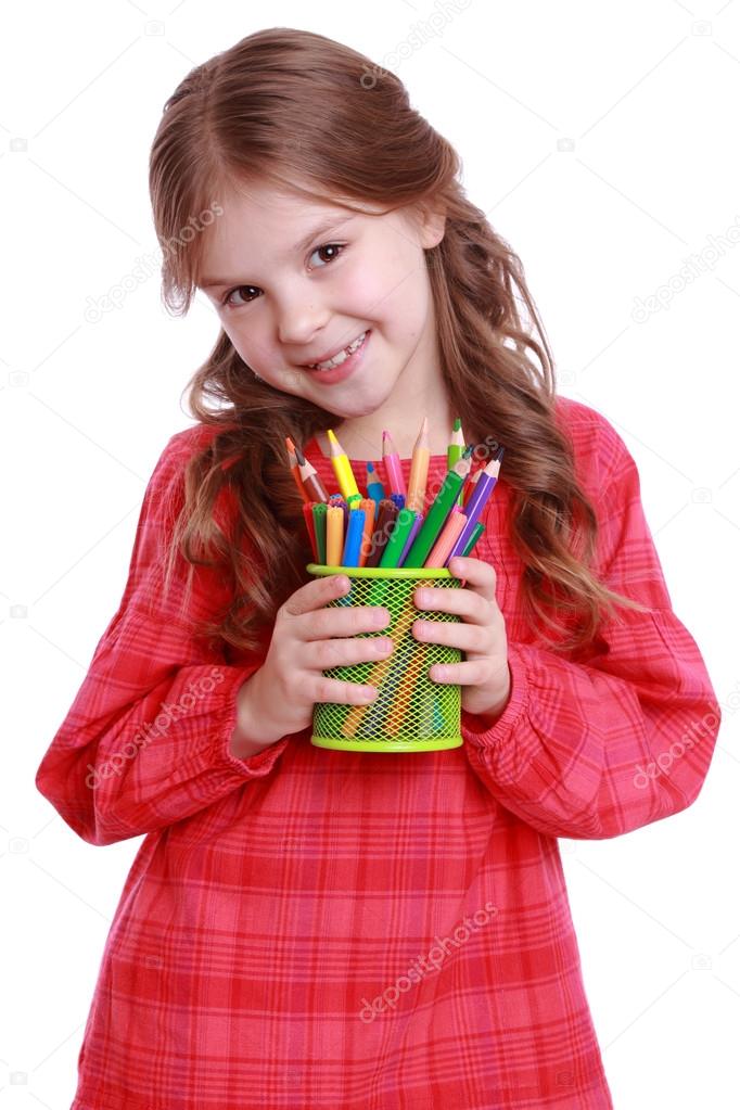 Kid with pencils