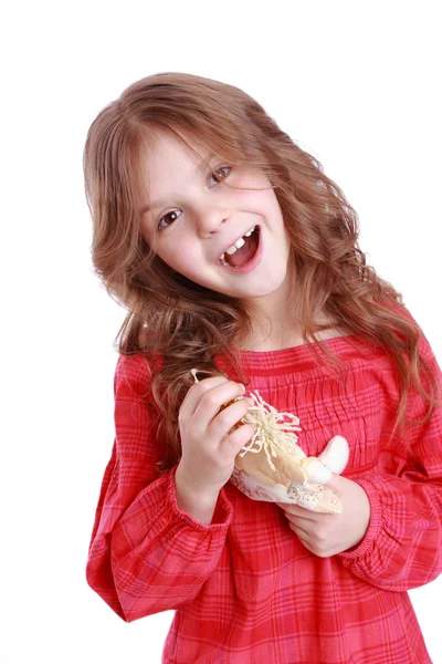 Little girl holding angel doll — Stock Photo, Image