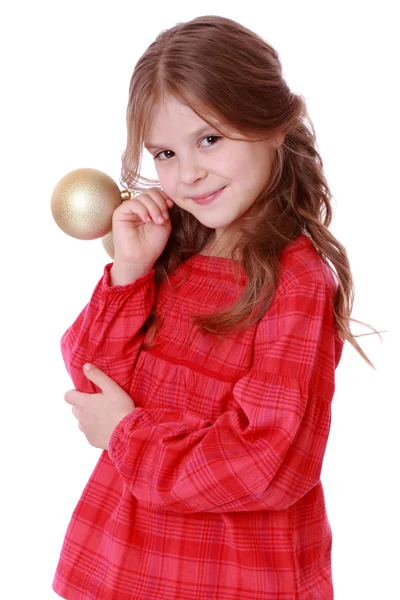 女孩拿着装饰黄金球 — 图库照片