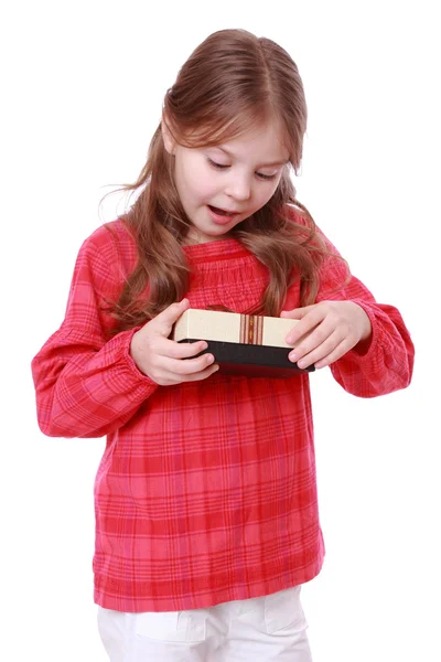 Girl holding present — Stock Photo, Image