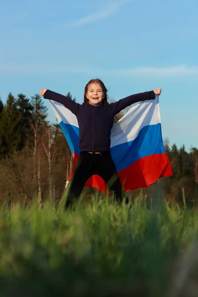 大ロシアの旗を保持している女の子 — ストック写真