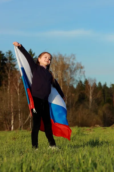 큰 러시아 국기를 들고 소녀 — 스톡 사진
