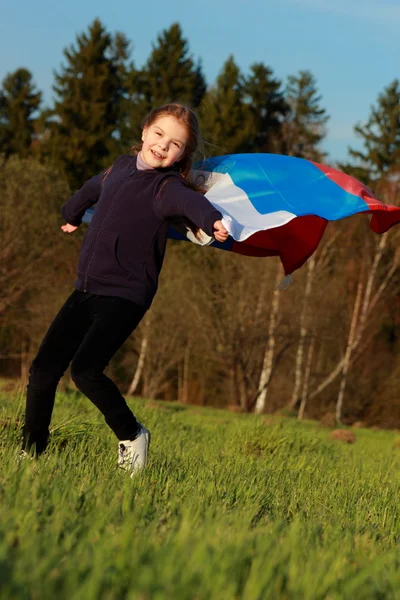 Güzel küçük bir kız Rus bayrağı ile — Stok fotoğraf
