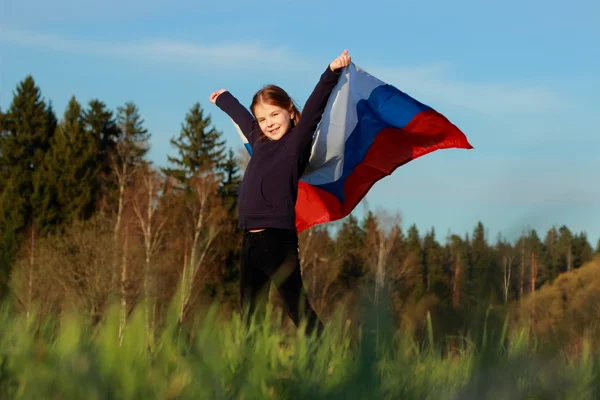 Krásná holčička s ruskou vlajkou — Stock fotografie