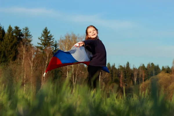 Mooi meisje met Russische vlag — Stockfoto