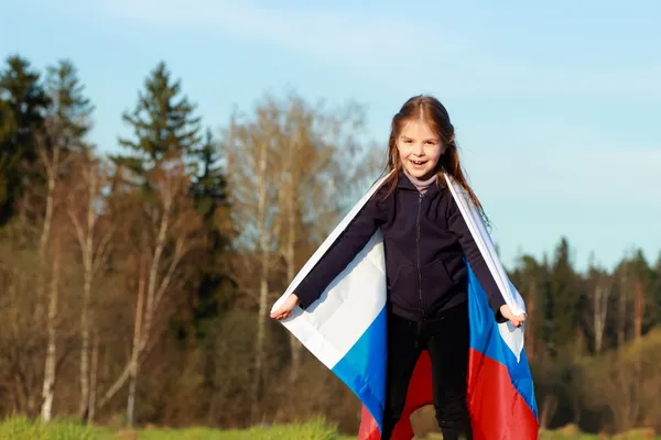 Mooi meisje met Russische vlag — Stockfoto