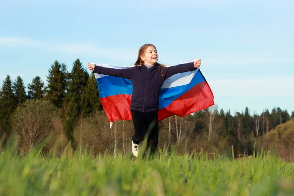 Mooi meisje met Russische vlag — Stockfoto