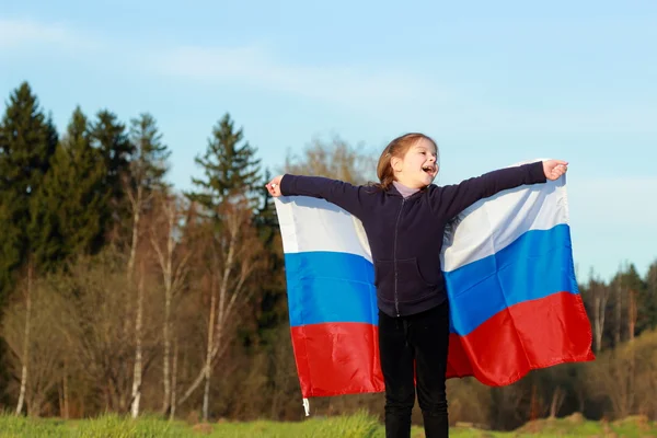 Vacker liten flicka med ryska flaggan — Stockfoto