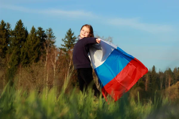 Beautiful little girl with Russian flag — Stock Photo, Image