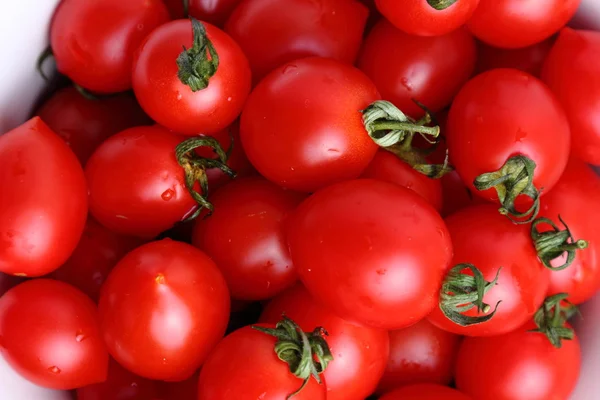 Pomidory czereśniowe tło — Zdjęcie stockowe