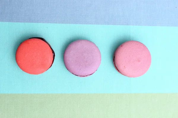 Three sweet colorful macaroons — Stock Photo, Image