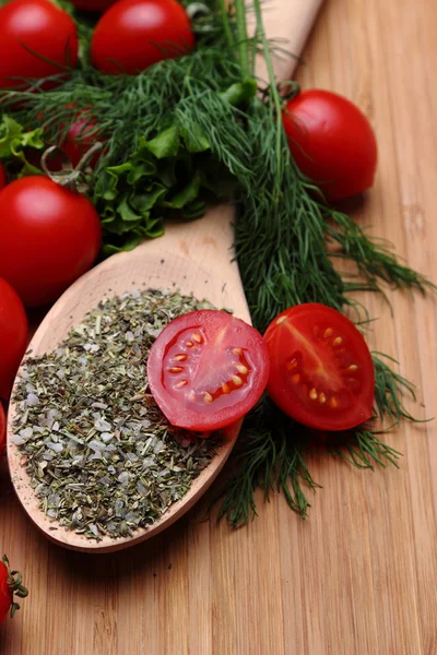 Tomatoes and herbs and spices — Stock Photo, Image