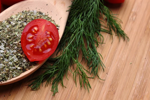 Tomatoes and herbs and spices — Stock Photo, Image