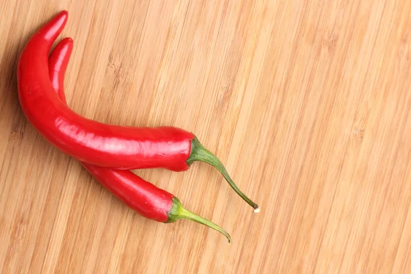 Two red chili peppers — Stockfoto