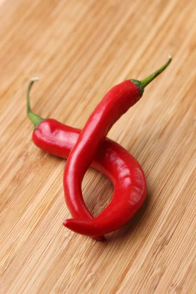 Two red chili peppers — Stockfoto